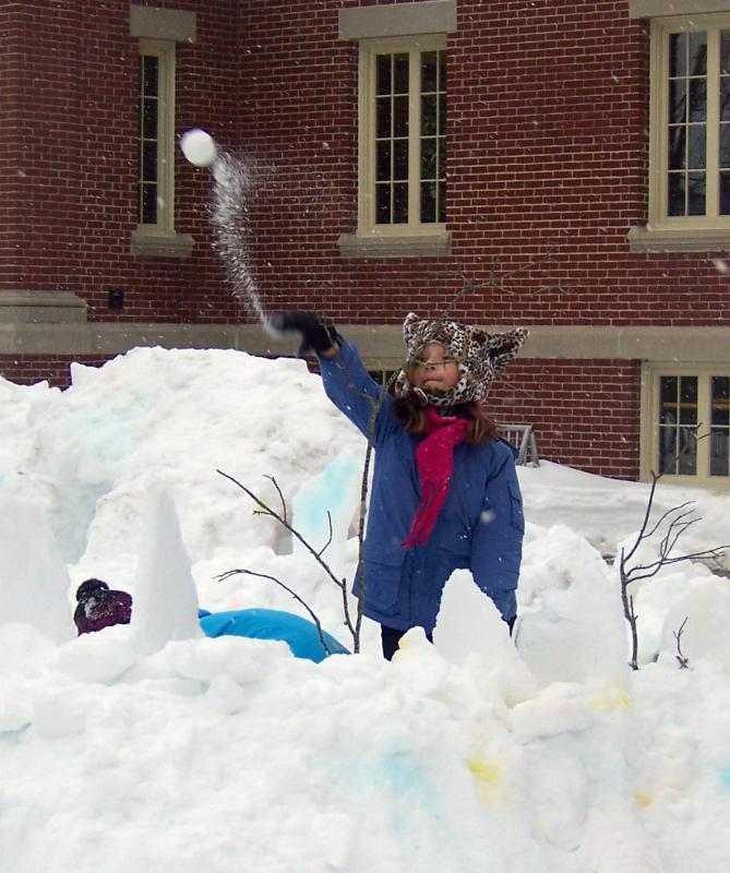 One young patron launches a snowball in a brief (and friendly) fight that took place on the library’s lawn. BY MATTHEW BERNAT